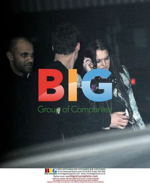 Lindsay Lohan Leaving Boujis with Two Men