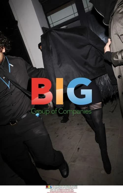 Lindsay Lohan Leaves Boujis with Men