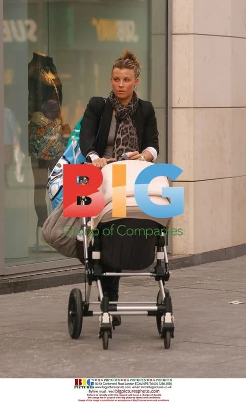 Coleen Rooney out shopping with baby Kai