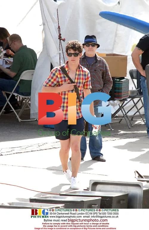 Nick Jonas Plays Catch on Set with Brothers