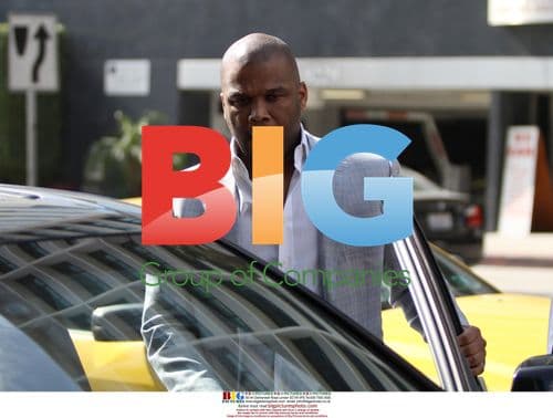 Oprah Winfrey and Tyler Perry leaving restaurant