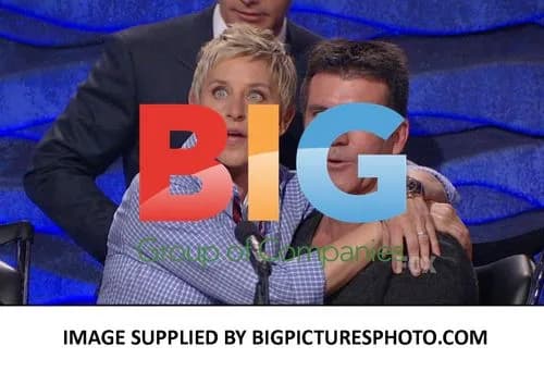 Ellen Degeneres flirting with Simon Cowell on American Idol