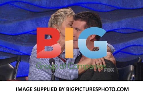 Ellen Degeneres flirting with Simon Cowell