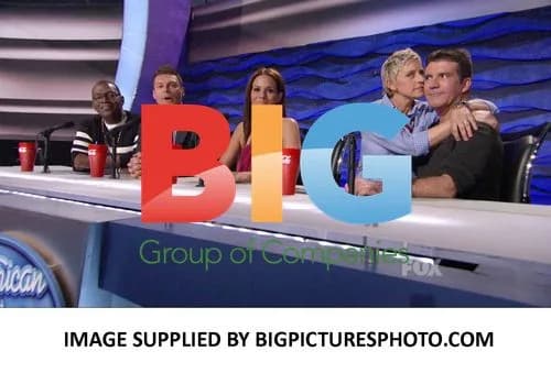 Ellen Flirts with Simon on American Idol