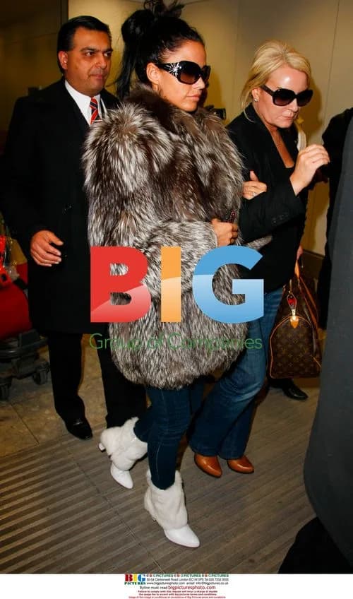 Katie Price Arrives at Heathrow