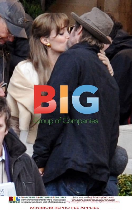 Brad Pitt, Angelina Jolie, and children on film set