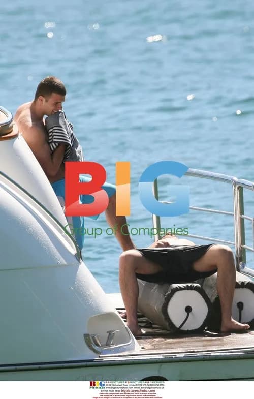George Michael Enjoys Boat Cruise with Boyfriend