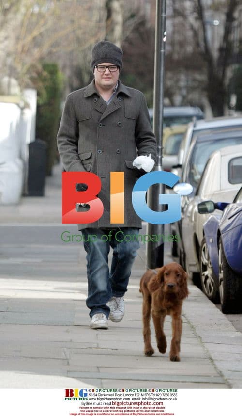 Alan Carr takes dog for walk