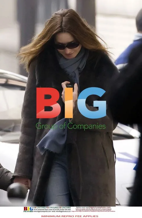 Carla Bruni Sarkozy picks up son Aurelien from school