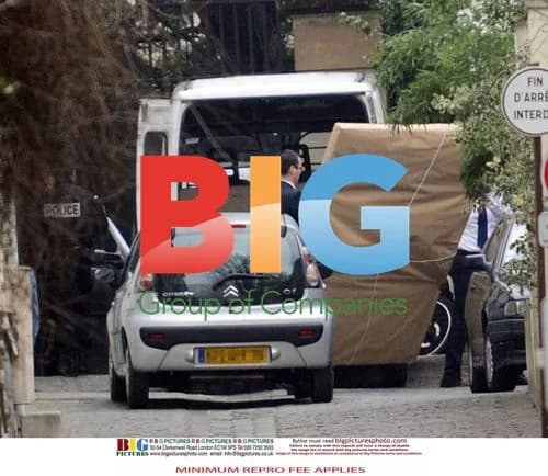Carla Bruni-Sarkozy picking up son from school