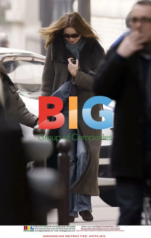 Carla Bruni Sarkozy Picks Up Son