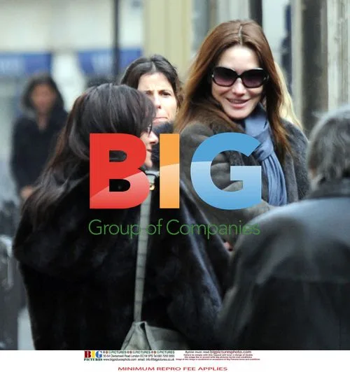 Carla Bruni Sarkozy Picking Up Son