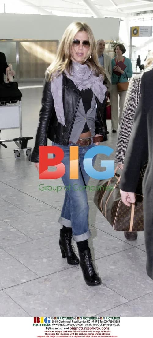 Jennifer Anniston Departs Heathrow