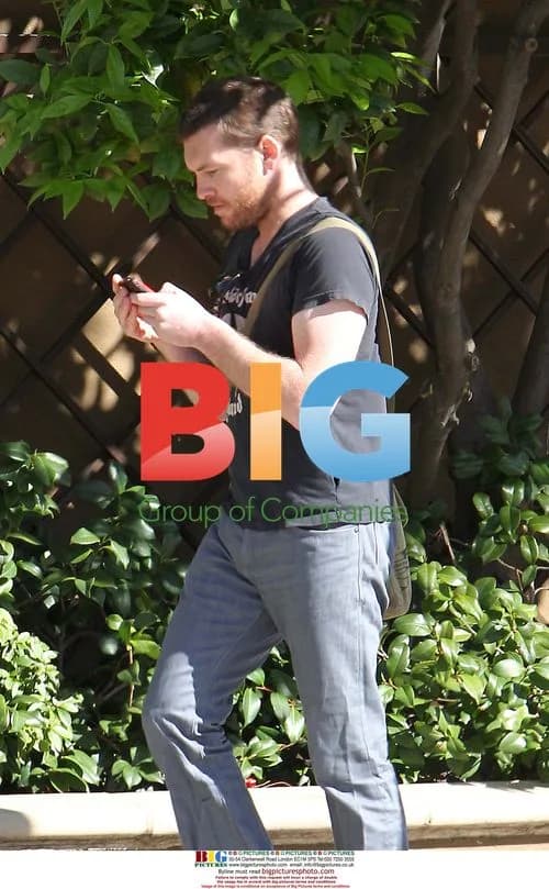 Sam Worthington Chatting in Beverly Hills
