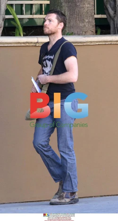 Sam Worthington on the phone in Beverly Hills