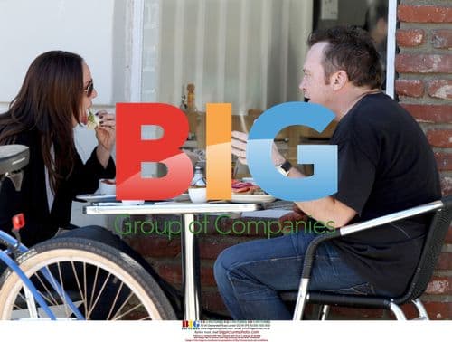 Tom Arnold and Friend Ride Bike