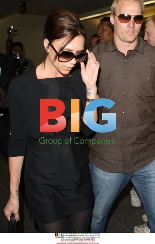 Victoria Beckham Comforts David
