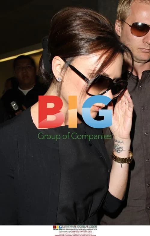 Victoria Beckham Comforts David