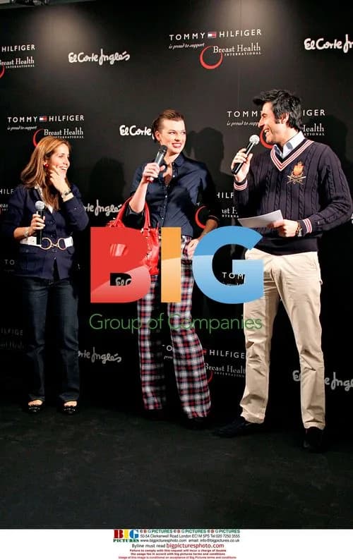 Milla Jovovich Promoting Handbag