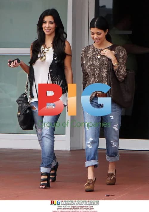 Kim and Kourtney Kardashian Leaving Store in Miami