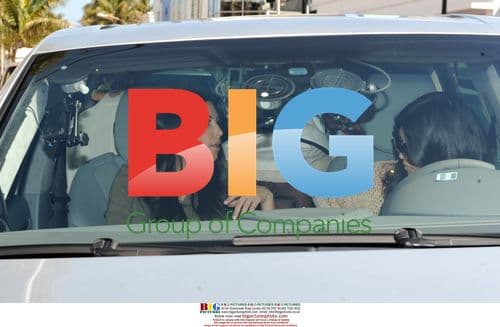 Kim and Kourtney Kardashian at Dash Store