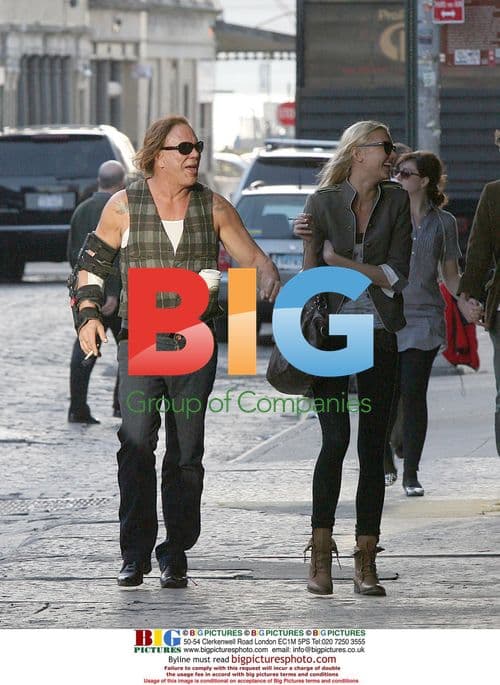 Mickey Rourke and girlfriend walking in NYC