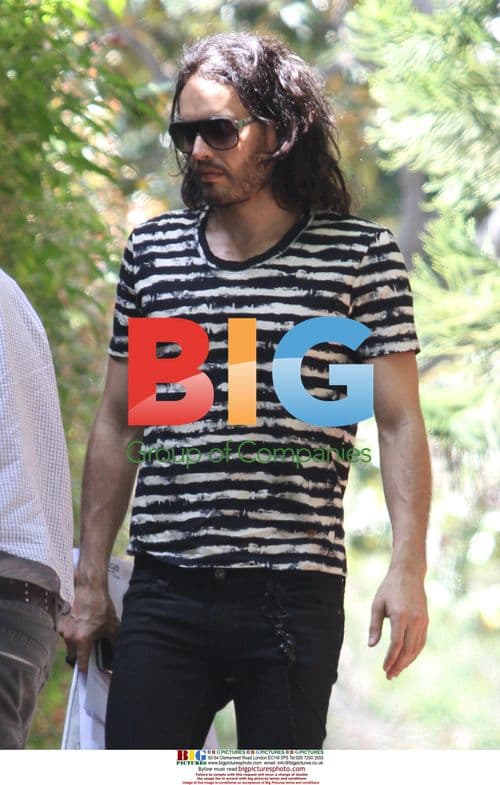 Katy Perry visits W Hotel, Russell Brand arrives home