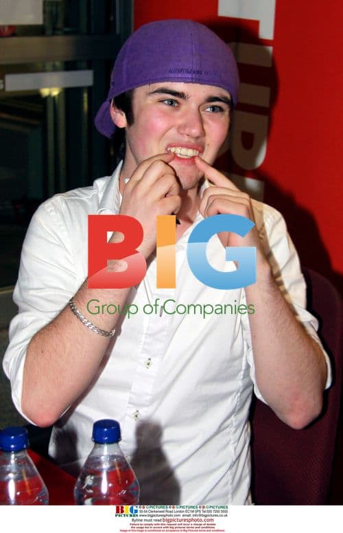 Cameron Bright signing autographs