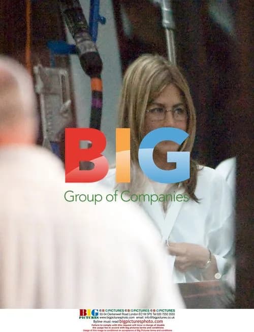 Jennifer Aniston and Adam Sandler on set