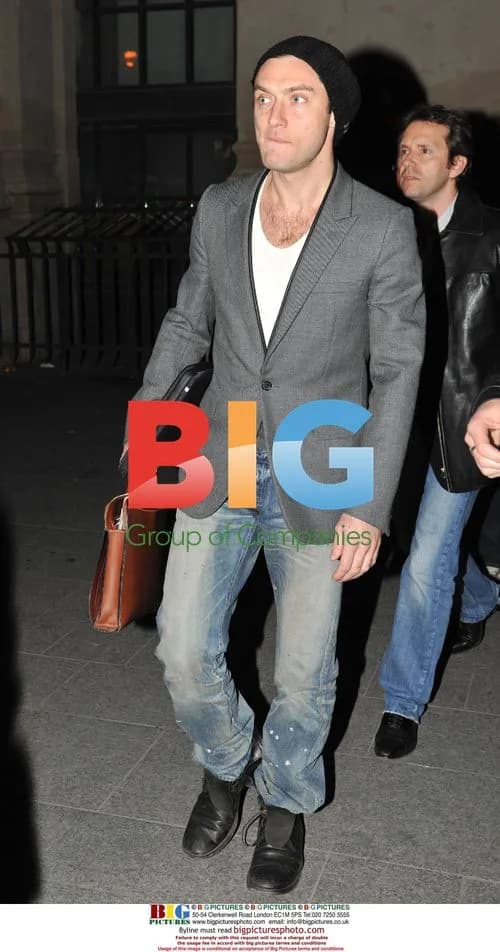 Jude Law Arrives in Paris