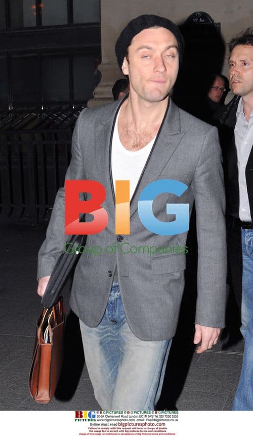 Jude Law Arrives in Paris