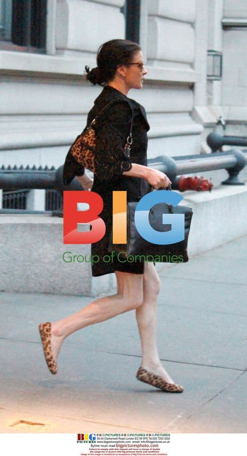 Catherine Zeta-Jones Rushing Out of NYC Home