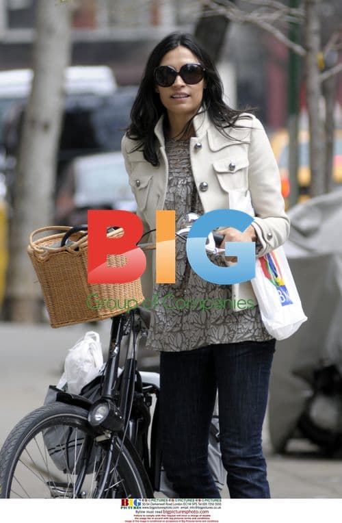 Famke Janssen Rides Bike in NYC
