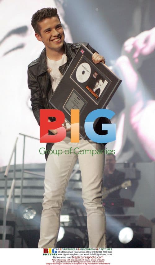 Joe McElderry Receives Platinum Disc Award at X Factor Tour