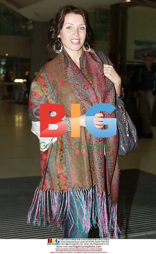 Dannii Minogue Arrives at Perth Airport