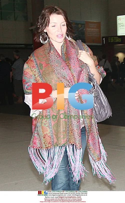 Dannii Minogue Arrives at Perth Airport