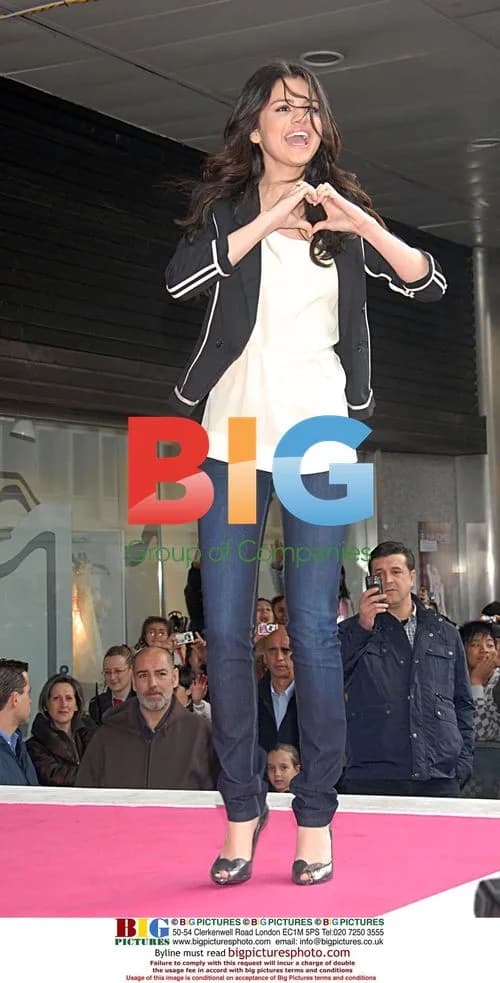 Selena Gomez Attends Album Photocall in Madrid