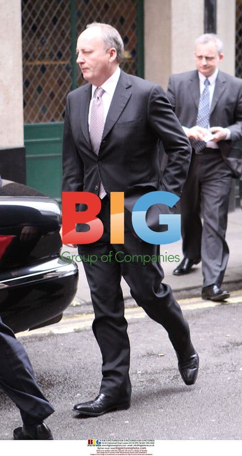 Secretary of State Woodward Leaving Restaurant