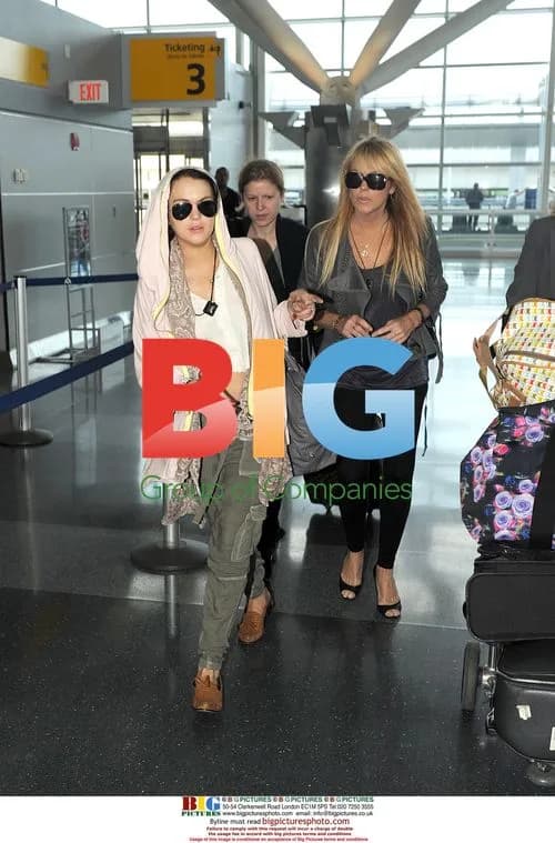 Lindsay Lohan and Dina Lohan at JFK Airport