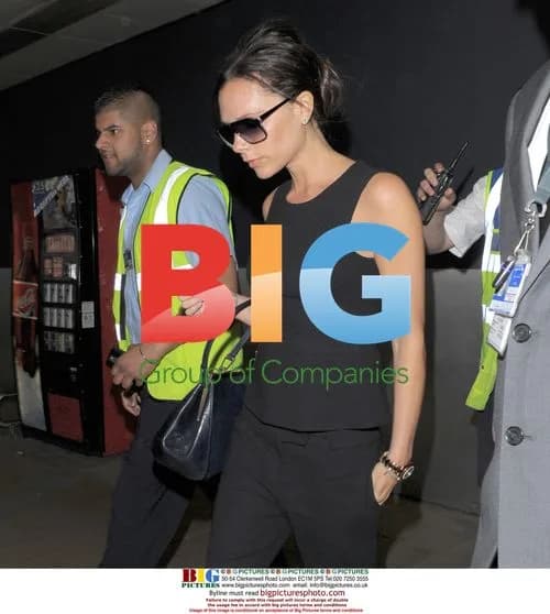 Victoria Beckham Arrives in UK