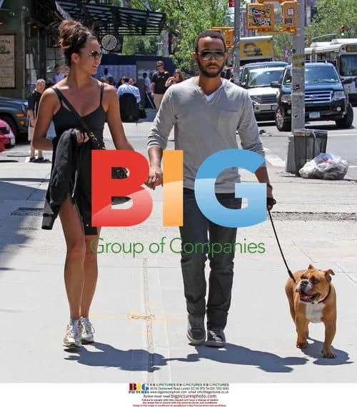 John Legend and Danielle Abreu walk dog in NYC
