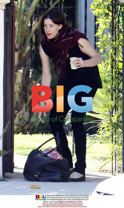 Liv Tyler boarding limo to LAX