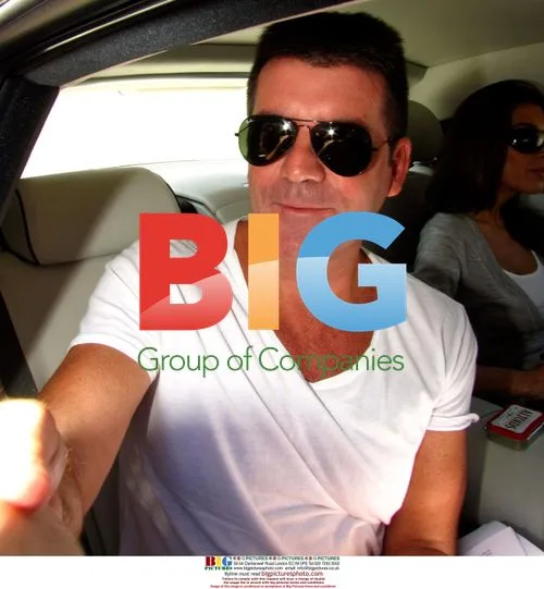 Simon Cowell and fiance greet fans in LA