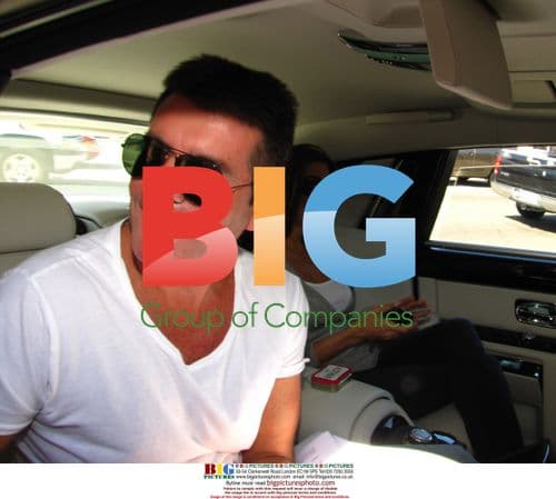 Simon Cowell and Mezhgan Hussainy Greet Fans