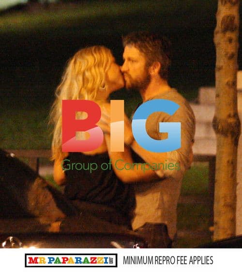 Gerard Butler Enjoys Night Out, Kisses Mystery Woman