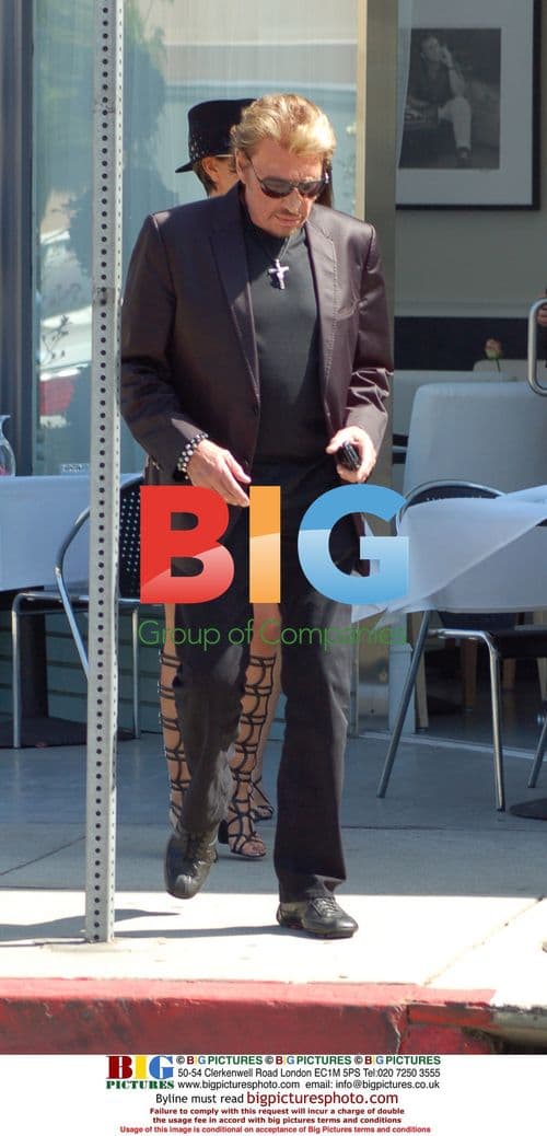 Johnny Halliday and Laetitia Boudou on Robertson Blvd