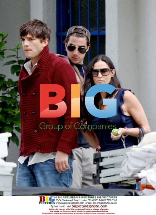 Ashton Kutcher and Demi Moore on set