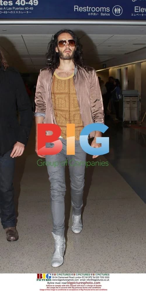 Russell Brand arrives at LAX