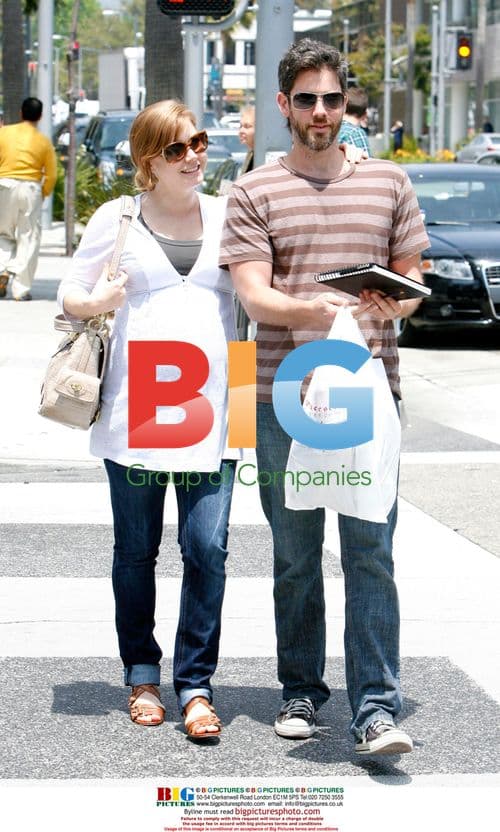 Pregnant Amy Adams with Husband