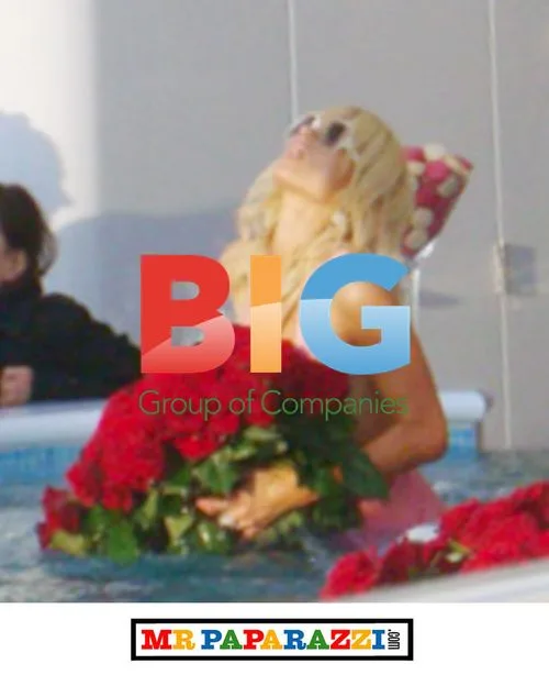 Paris Hilton Jumps Into Hot Tub